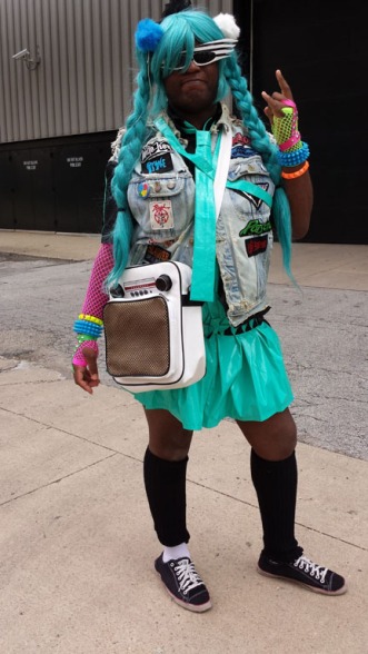 he's a 1980s Hatsune Miku. He said he was looking for a boombox to carry around, but instead found this speaker inspired satchel. The dials on the satchel moved back and forth!  excellent!